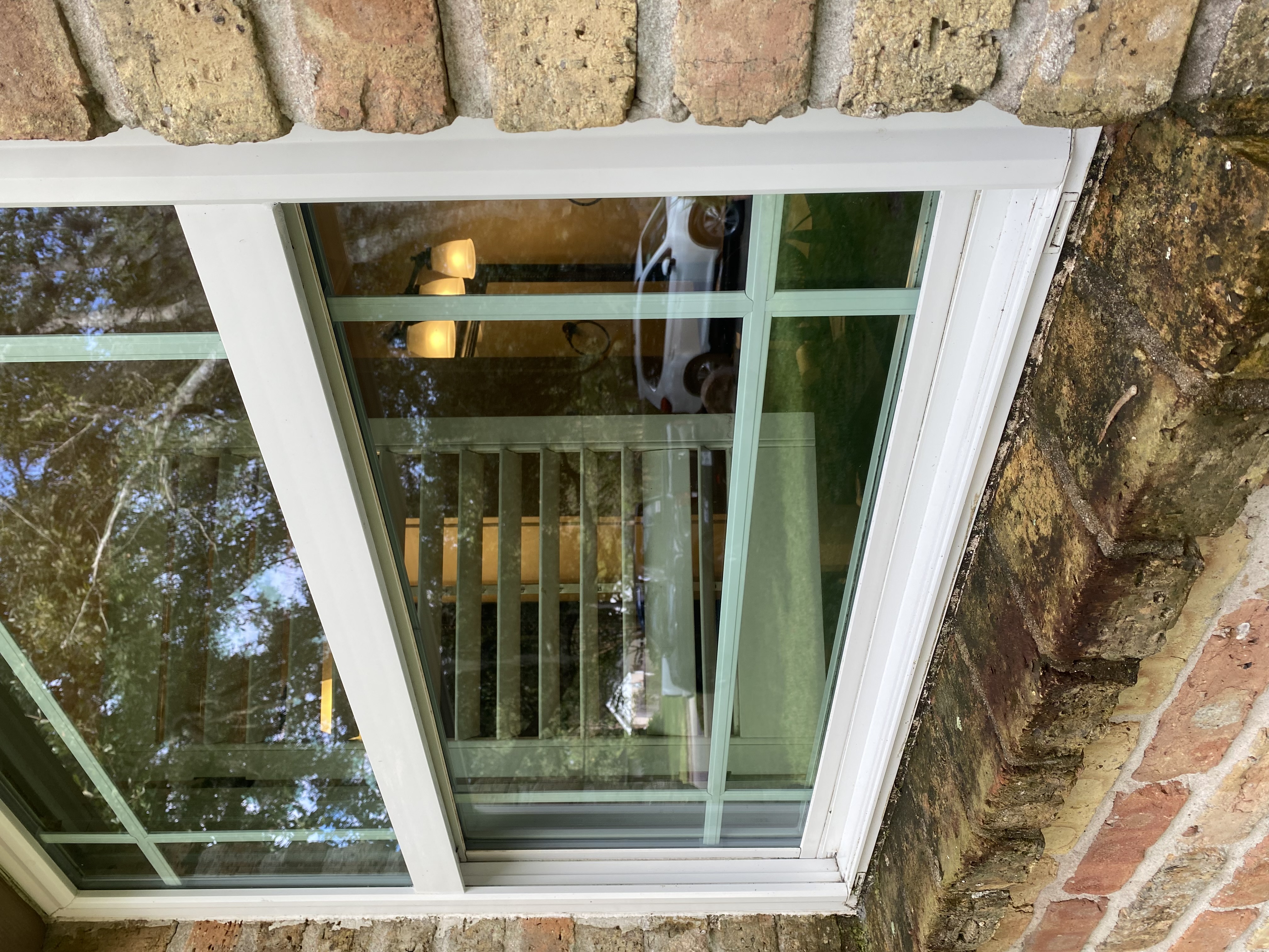 Clean brick house window after