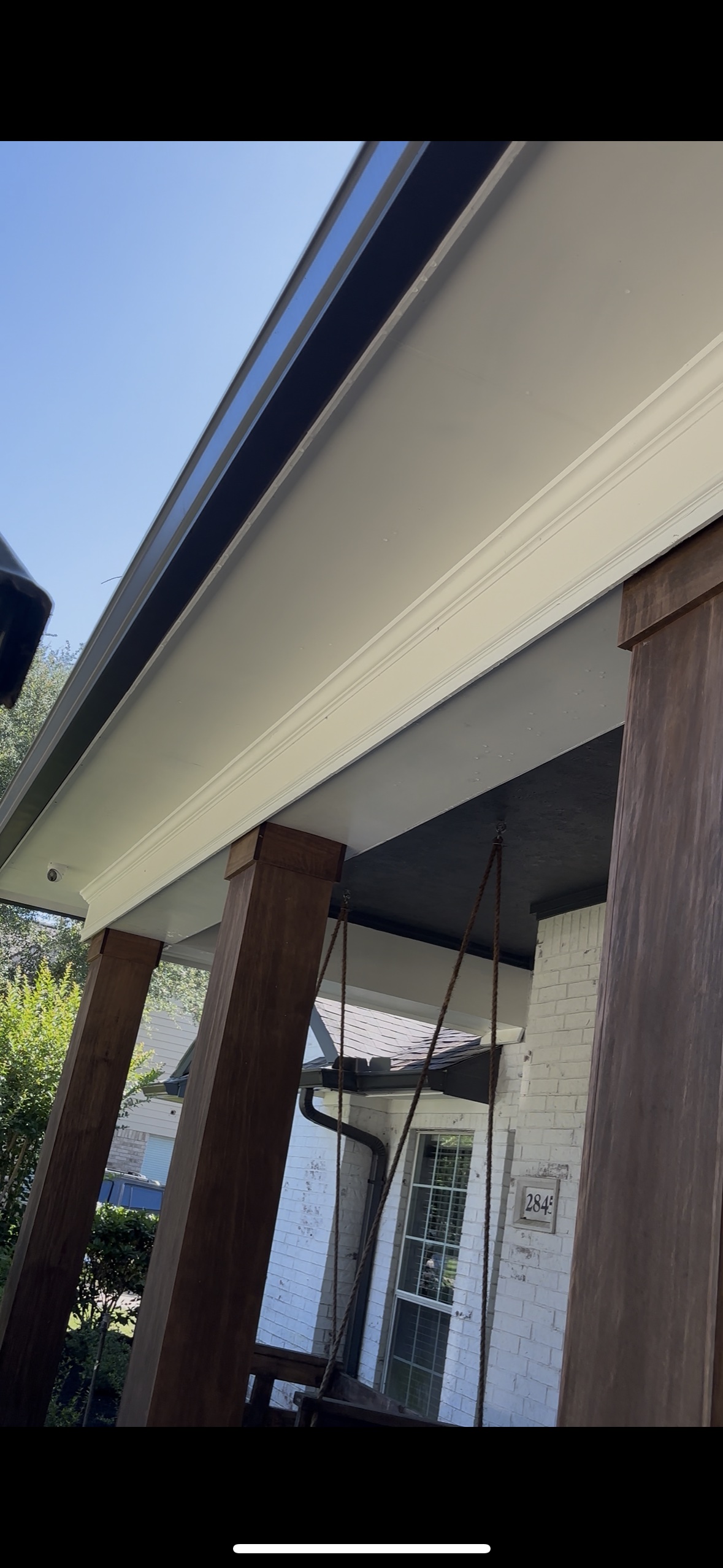 Clean porch soffit and trim after