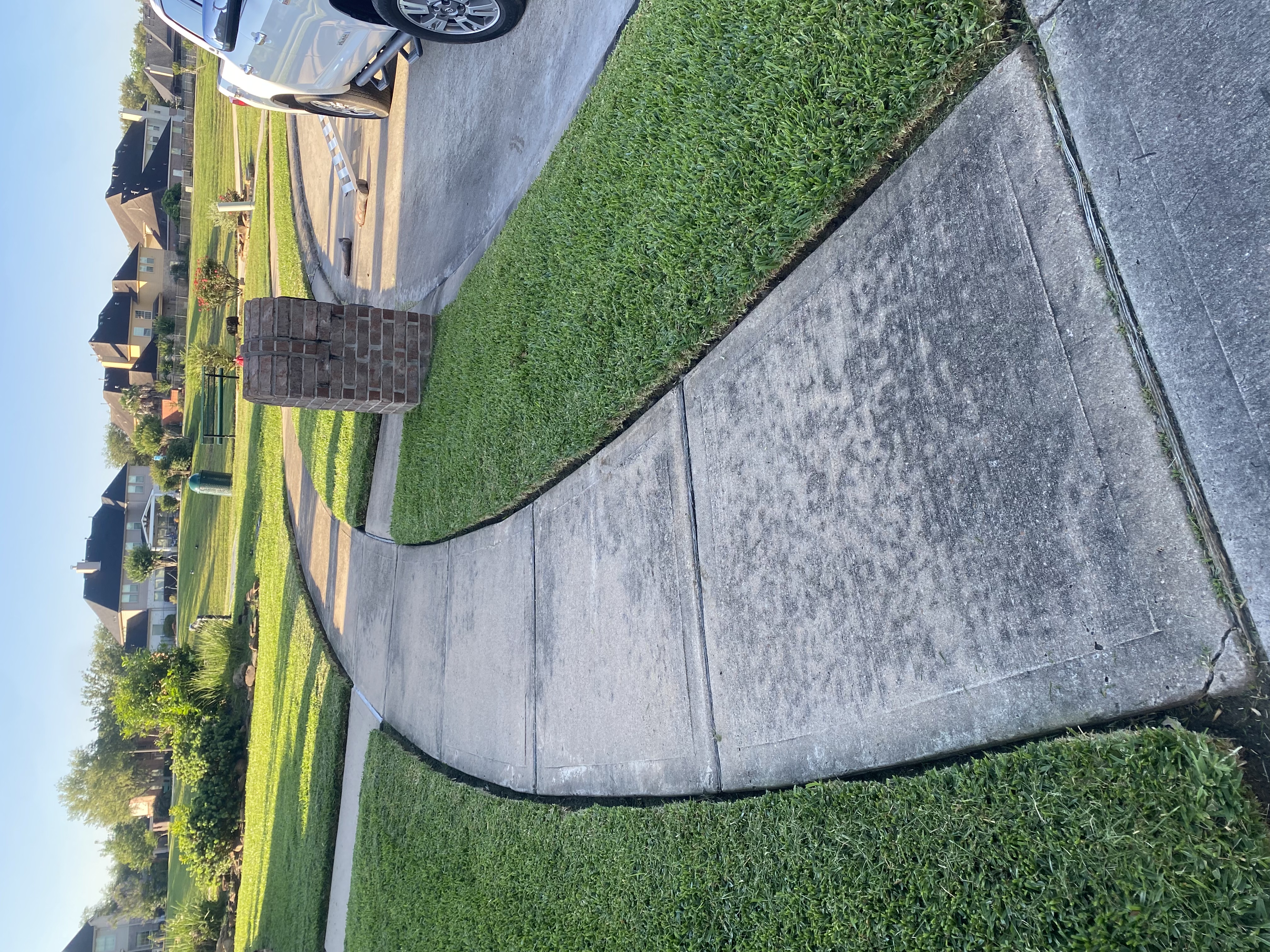 Stained suburban driveway before