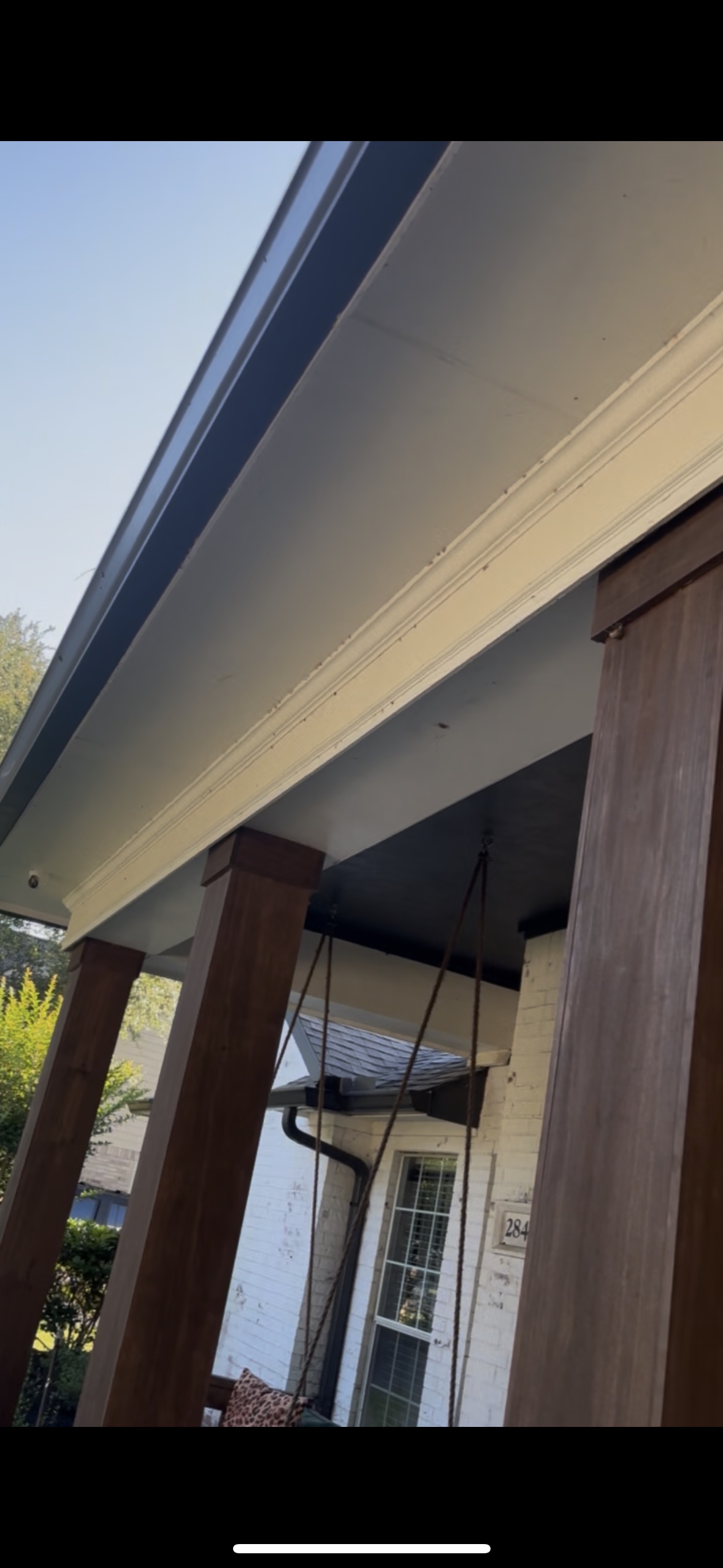 Dirty porch soffit and trim before