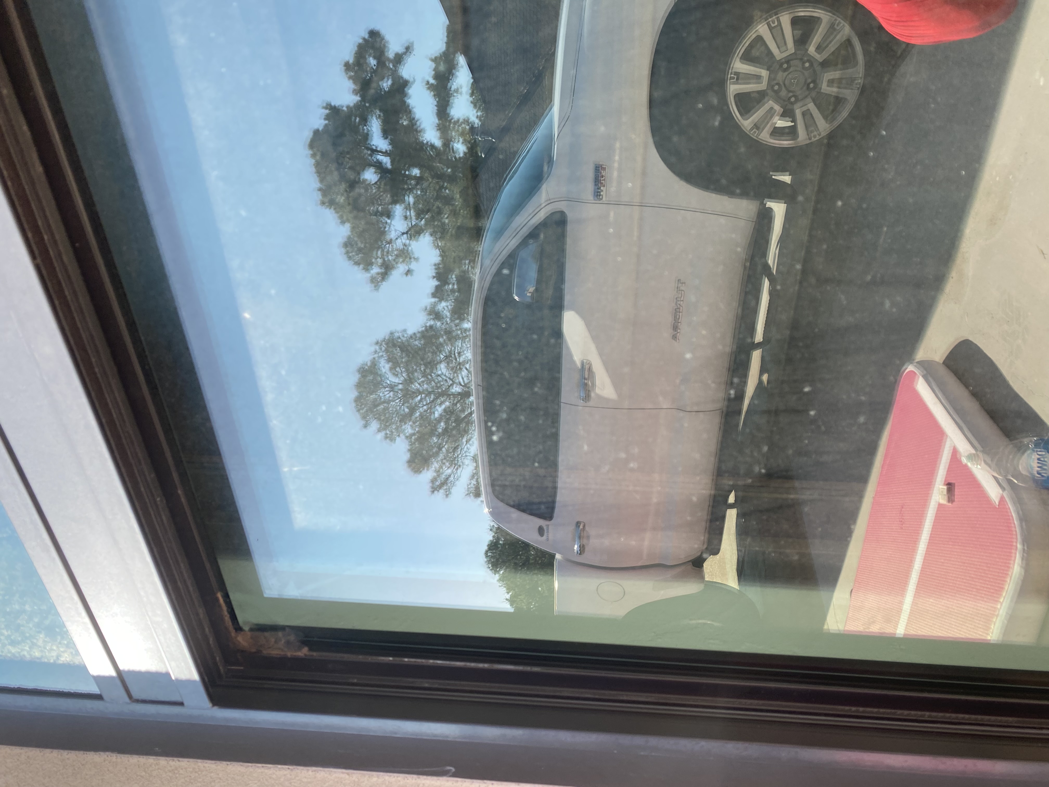 Dirty sliding glass door before